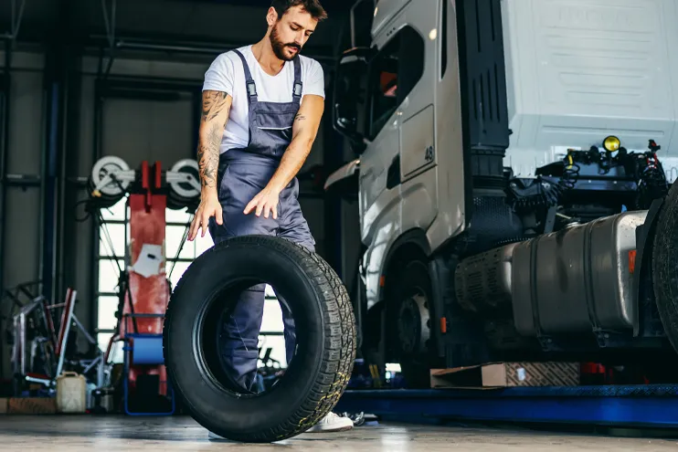 mechanic changing semi truck tire mechanic changing semi truck tire